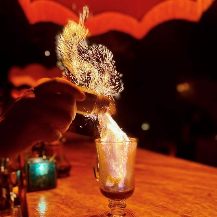Drink with salt shaker and sparks